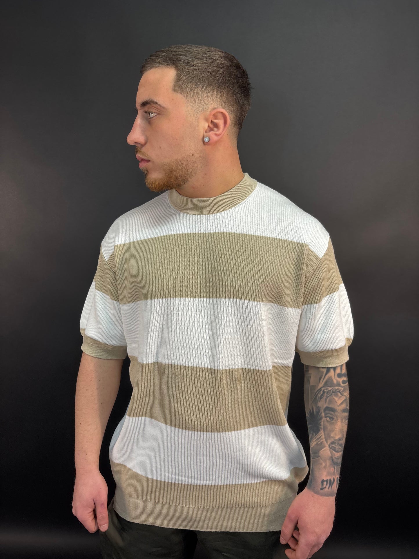 Maglia a righe beige e bianca