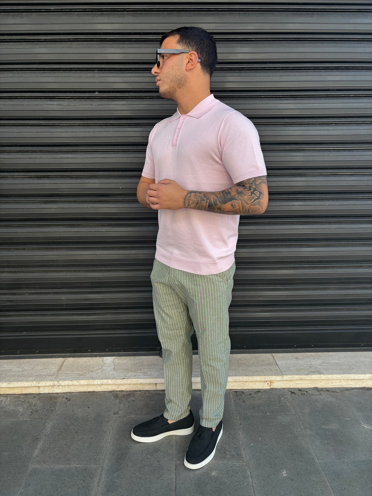 Pantalone a righe verde e bianco