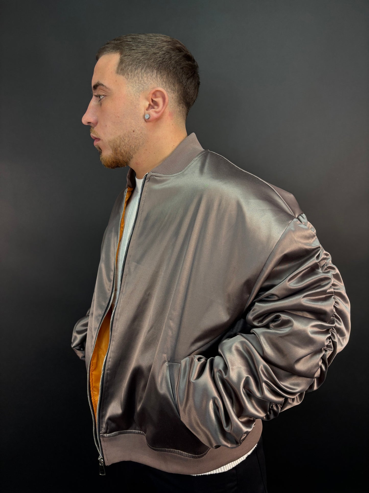 Giacca drapped bronzo
