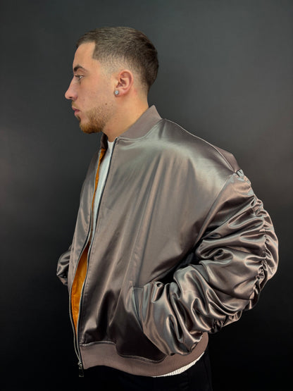 Giacca drapped bronzo