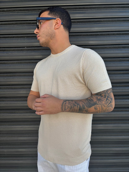 Maglia beige ricamata