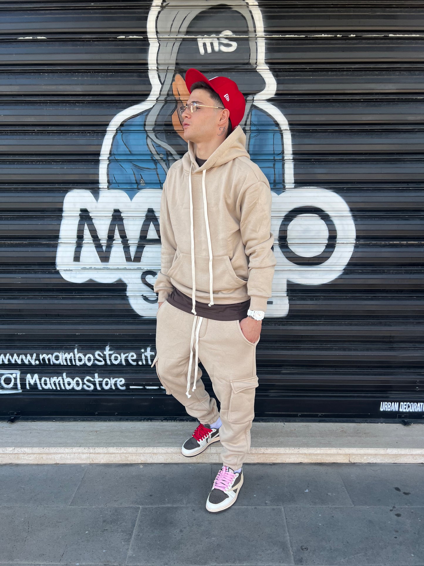 Tuta cargo stretta sotto beige