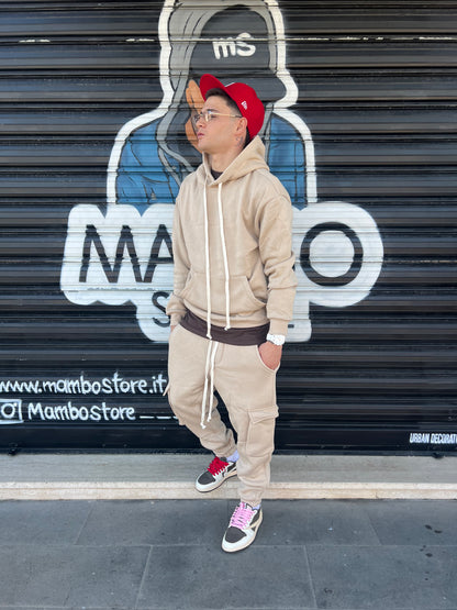 Tuta cargo stretta sotto beige