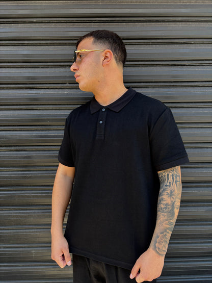 Completo polo e pantaloncino nero