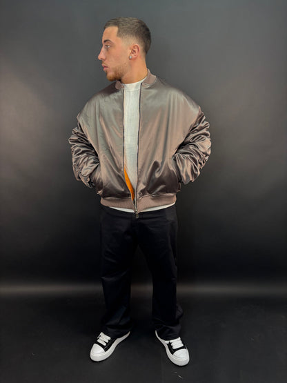 Giacca drapped bronzo