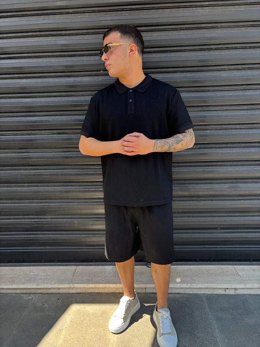Completo polo e pantaloncino nero