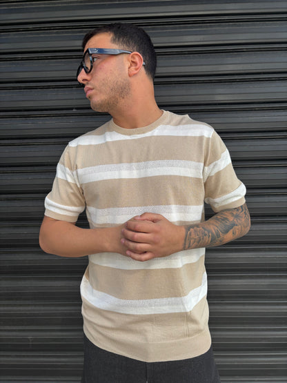 Maglia a righe beige e bianca traforata