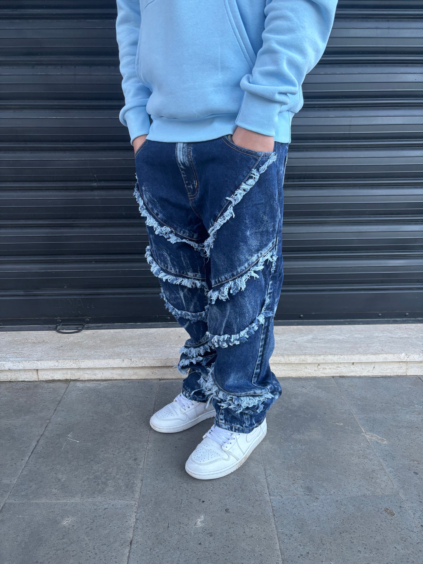 Jeans sfrangiato blu