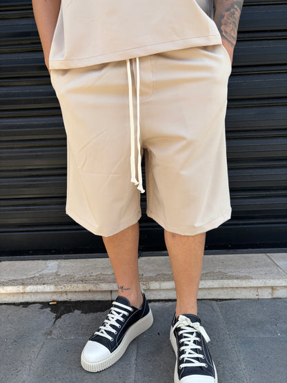 Completo maglia mezza zip e pantaloncino beige